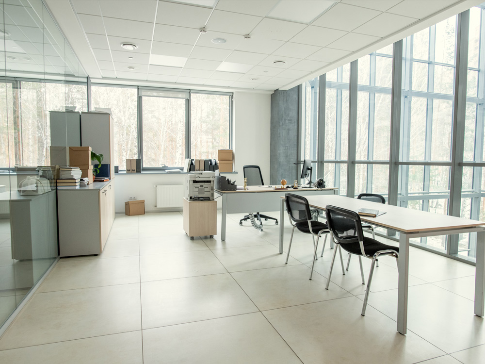 Office cleaning in Hamilton. A clean office with beige colour furniture and a panoramic view.