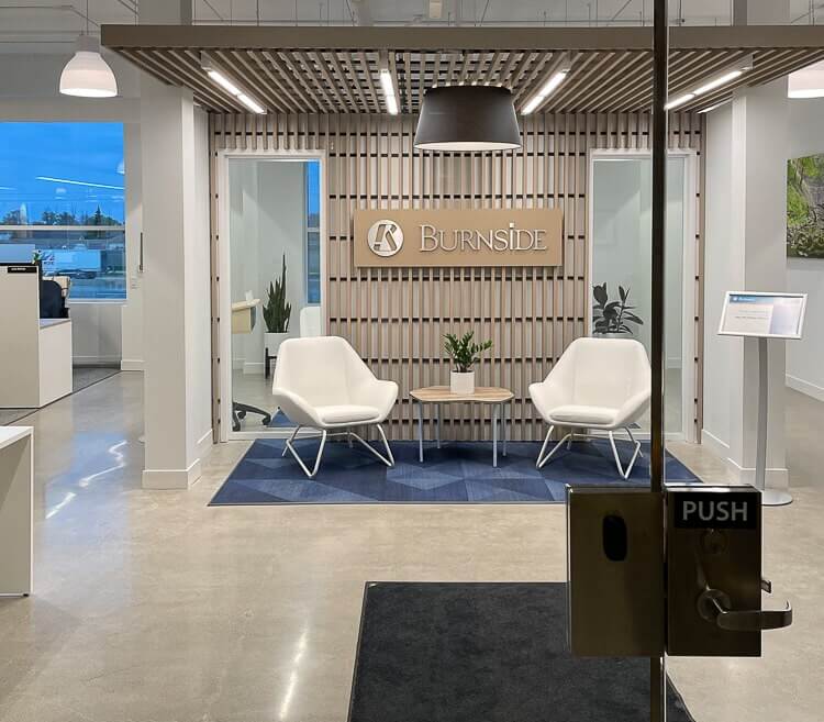 Office Cleaning Services – Disinfected Reception Area in Hamilton Clean and disinfected office reception area with seating and signage in Hamilton, maintained by iCleaners