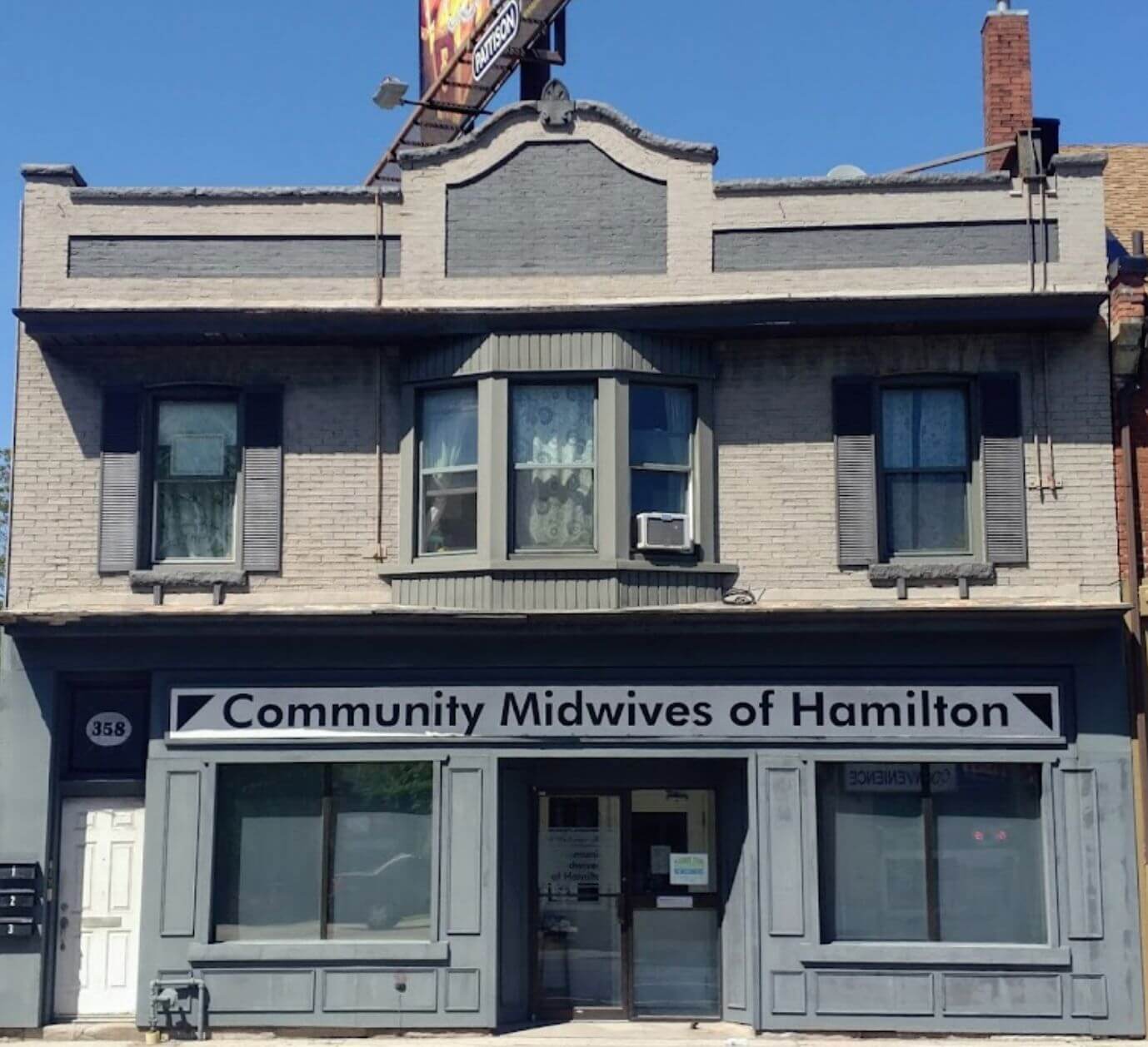 Commercial Cleaning Services – Community Midwives of Hamilton Building Front view of the Community Midwives of Hamilton building at 1057 Main St W, cleaned by iCleaners