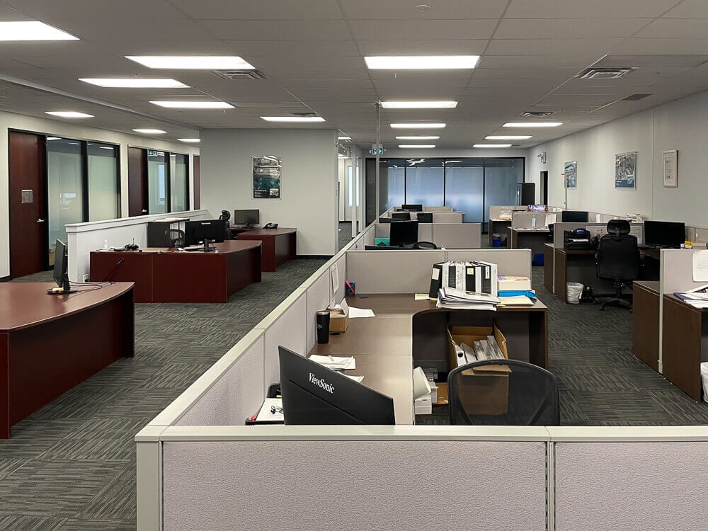 Office cleaning team communicating with staff